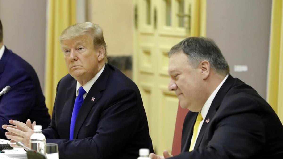 Ex-President Donald Trump, left, and Secretary of State Mike Pompeo