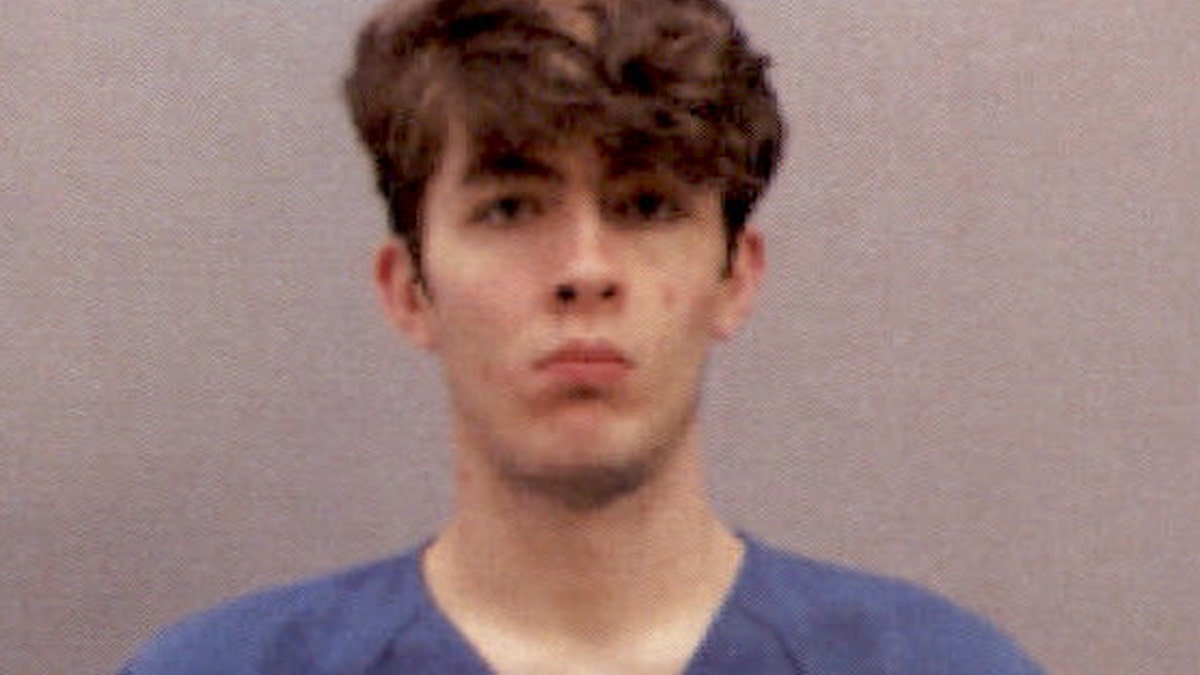 Wade Edward Winn, 23, was taken into custody after barricading himself inside an apartment and shooting at police officers who tried to get him to surrender.
