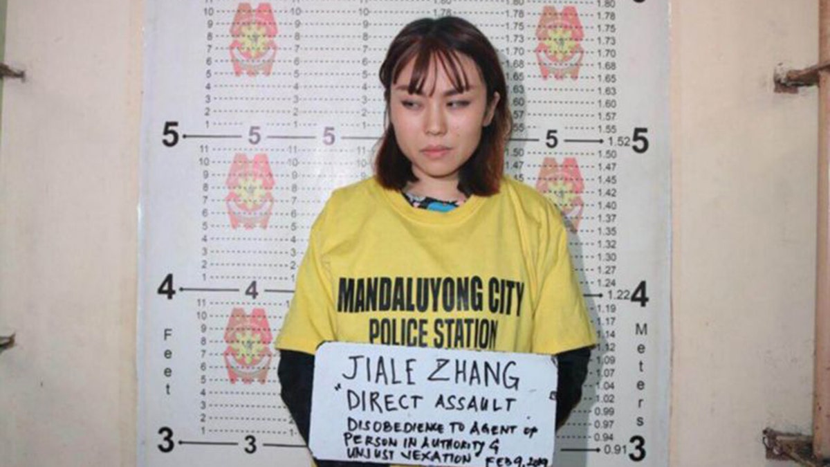 Zhang Jaile, 23, faces deportation from the Philippines after throwing a cup of soybean pudding on a police officer at a train station in Manila.