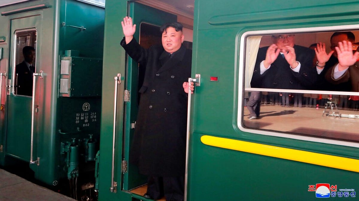 North Korean leader Kim Jong Un, on a recent train ride, a change of pace for a man used to commuting in luxury vehicles.  (Korean Central News Agency/Korea News Service via AP)