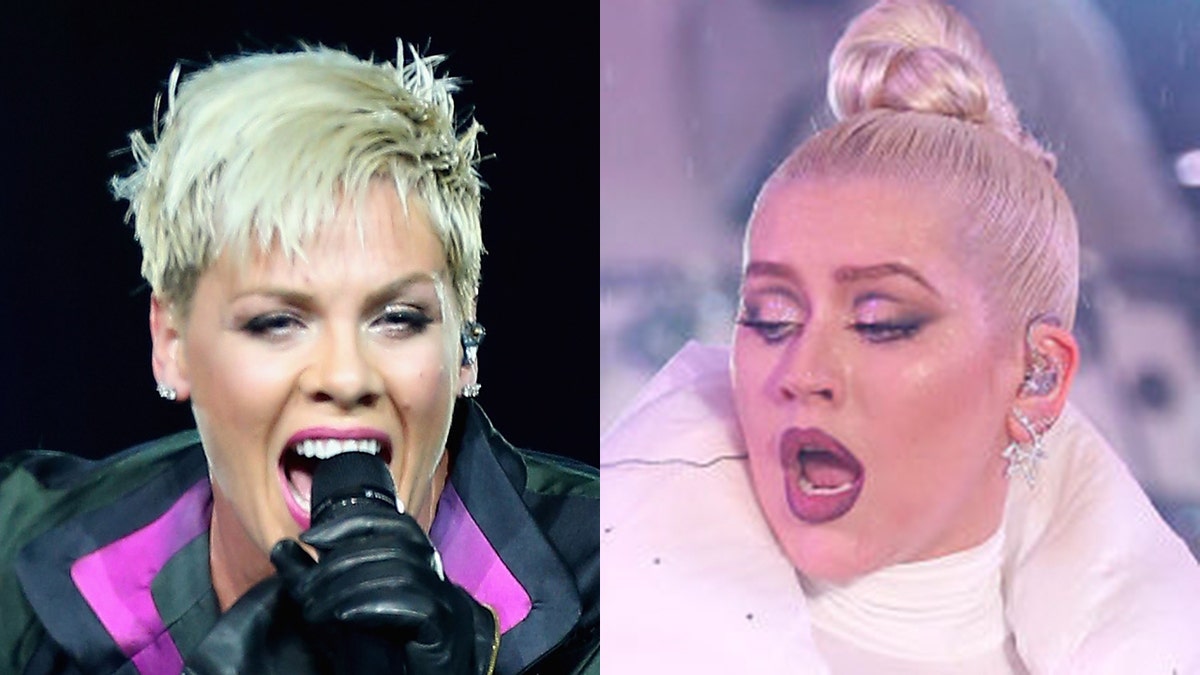 Christina Aguilera [right] denies she ever tried to swing at Pink [left]. 