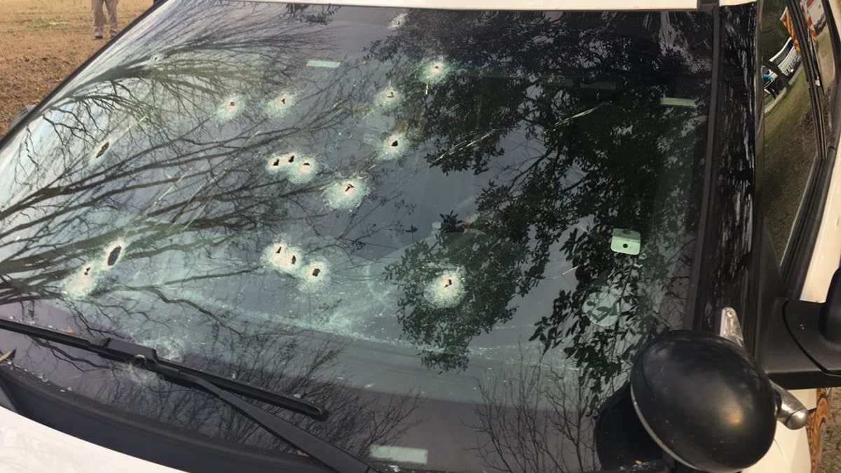 Authorities in South Carolina said that a suspect riddled a sheriff's deputy's vehicle during a shoot-out in Huger on Tuesday.