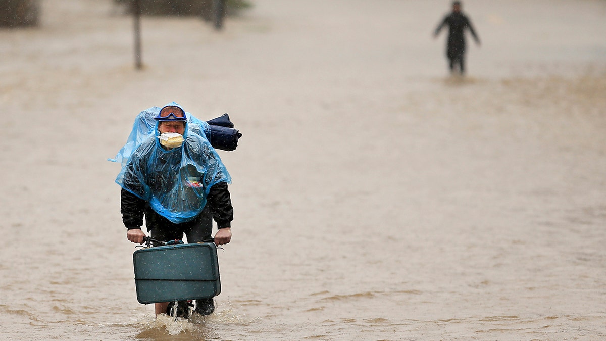 The town of Guerneville and some two dozen other communities are at risk of flooding from the Russian River north of San Francisco, which hit flood stage Tuesday evening and was expected to peak Wednesday morning at more than 46 feet - the highest point in nearly a quarter-century.