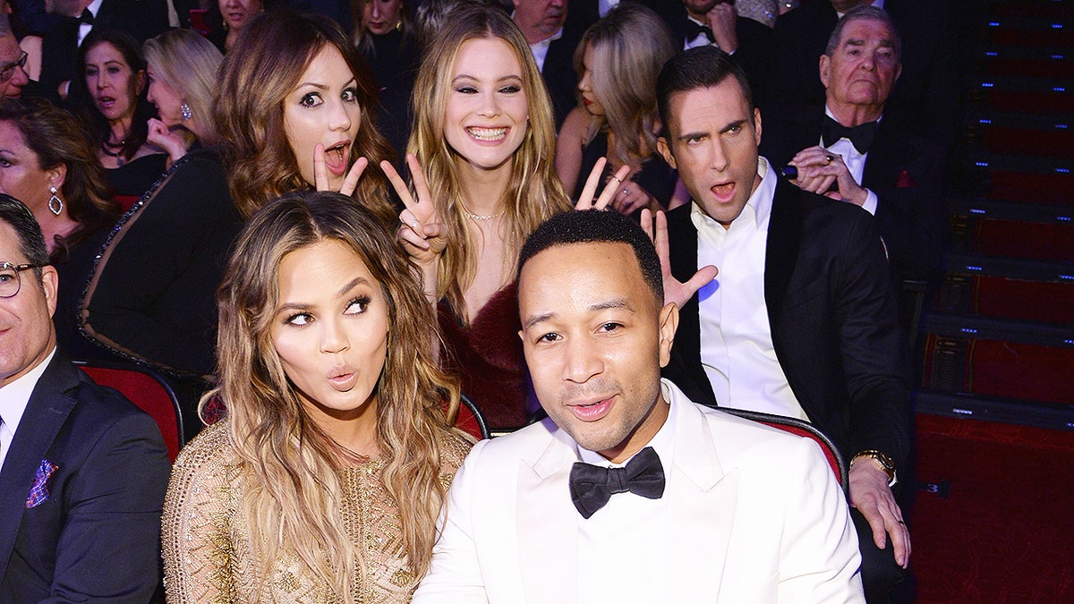 LAS VEGAS, NV - DECEMBER 02:  Singer Katharine McPhee, model Behati Prinsloo, singer Adam Levine, model Chrissy Teigen and recording artist John Legend attend  