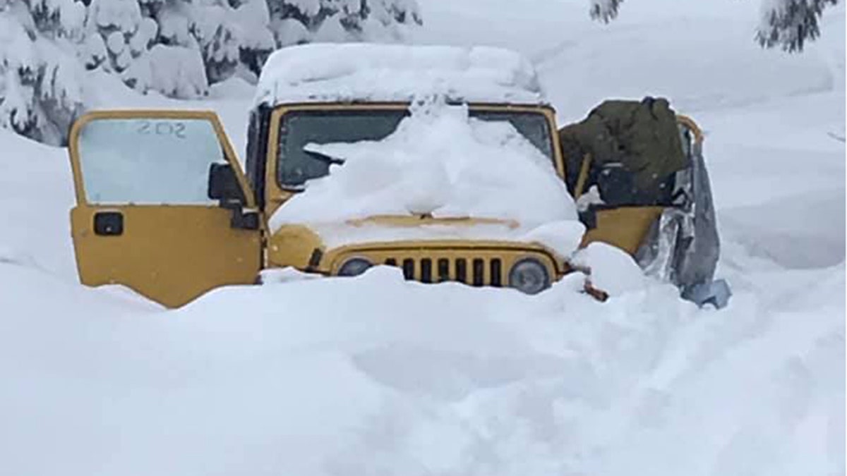The Jeep got stuck in the snow at the Mendocino National Forest.
