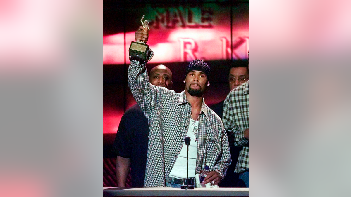 FILE - In this March 26, 1999 file photo, R. Kelly accepts the Sammy Davis Jr. Award for Male "Entertainer of the Year" at the 13th annual Soul Train Music Awards in Los Angeles. (AP Photo/Mark J. Terrill, File)