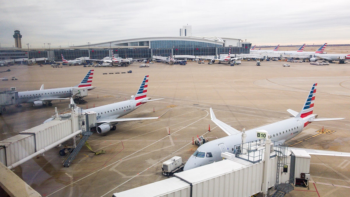 Flights in the Dallas area were delayed Wednesday afternoon when air traffic controllers were forced to evacuate the Terminal Radar Approach Control (TRACON) after a report of smoke in the building.