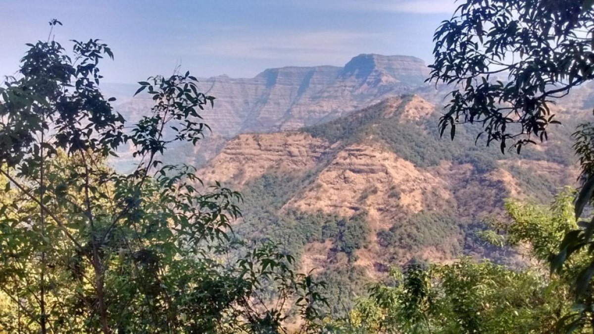 Layered lava flows within the Wai Subgroup from near Ambenali Ghat, Western Ghats. (Credit: Courtney Sprain)