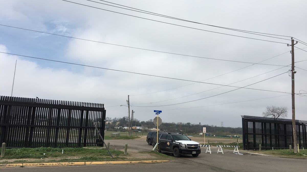 Behind the vehicle is a park abutting the Rio Grande, which has been closed in anticipation of the caravan's arrival. (Maggie Kerkman)