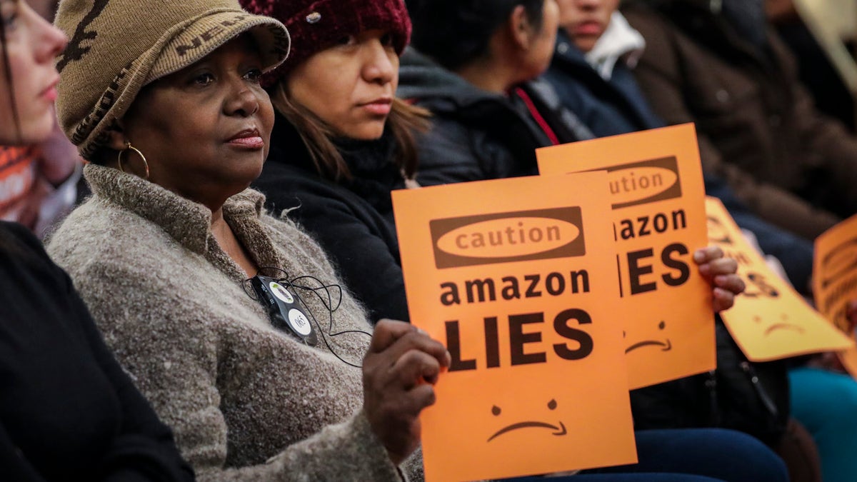 Protesters attend a New York City Council Finance Committee hearing titled 'Amazon HQ2 Stage 2: Does the Amazon Deal Deliver for New York City Residents?' at City Hall back in late January. (Photo by Drew Angerer/Getty Images)