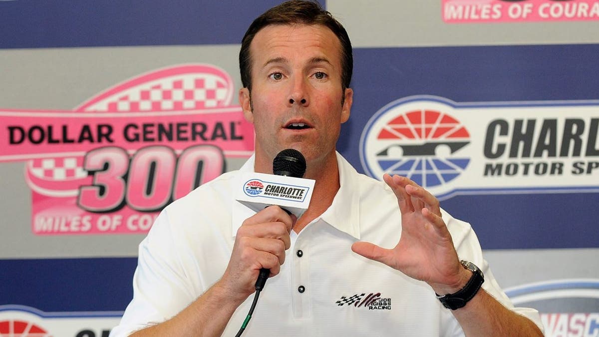 J.D. Gibbs, who died Jan. 11 at age 49, was president of Joe Gibbs Racing and the son of former NFL head coach Joe Gibbs. He is seen speaking at a news conference in Concord, N.C., Oct. 14, 2011. (Associated Press)