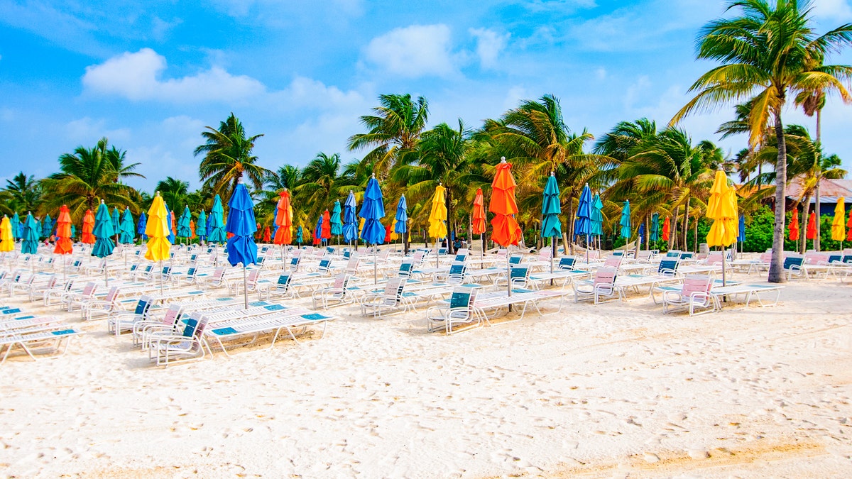 colorful beach umbrellas in closed position