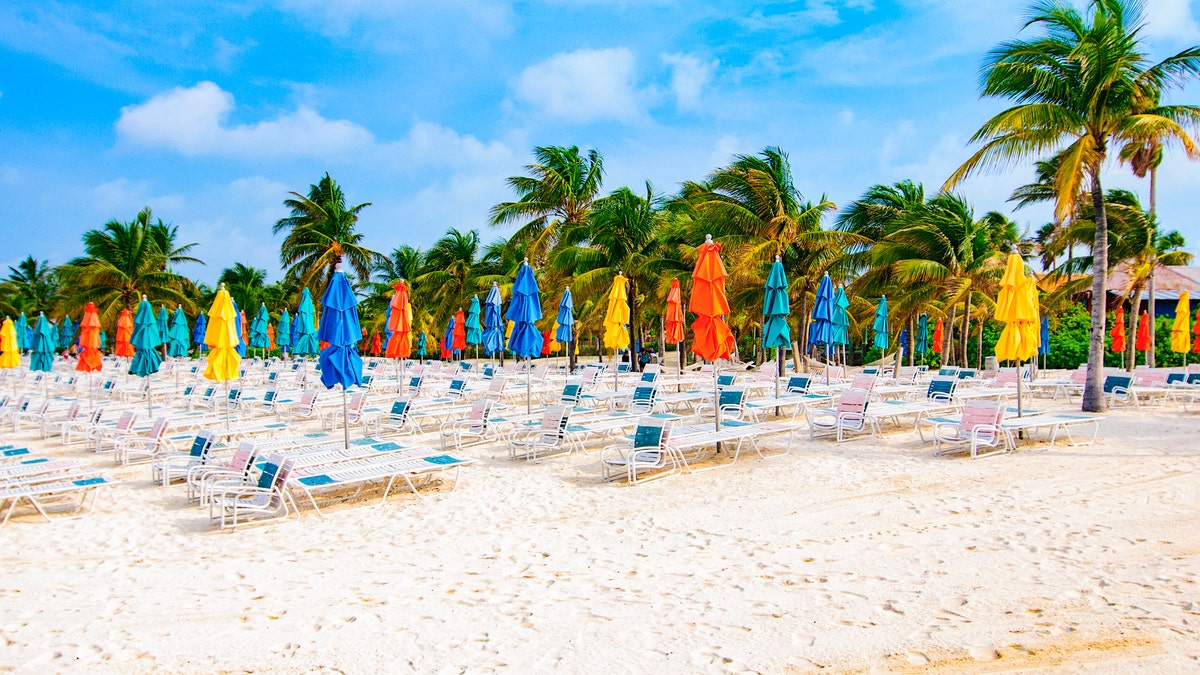 colorful beach umbrellas in closed position