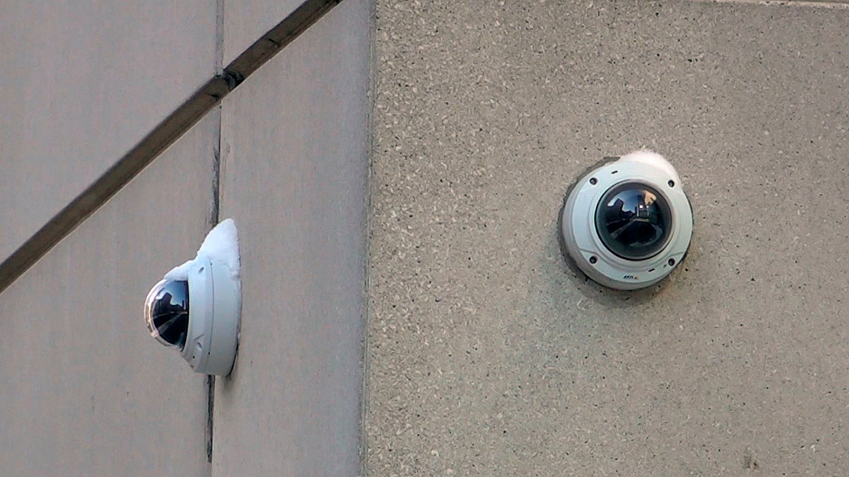 In this Feb. 1, 2019 photo, surveillance cameras are seen near the spot where "Empire" actor Jussie Smollett allegedly staged the attack in Chicago. Chicago police tapped into a vast network of surveillance cameras _ and some homeowners' doorbell cameras _ to help determine the identities of two brothers who later claimed they were paid by "Empire" actor Jussie Smollett to stage a racist and homophobic attack. (AP Photo/Teresa Crawford)