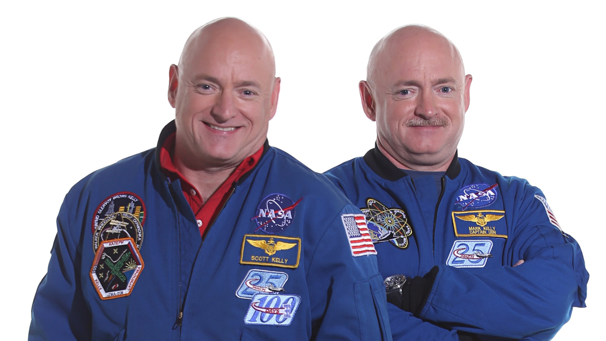File photo - Scott Kelly (left) spent a year in space while his identical twin Mark (right) stayed on Earth as a control subject.