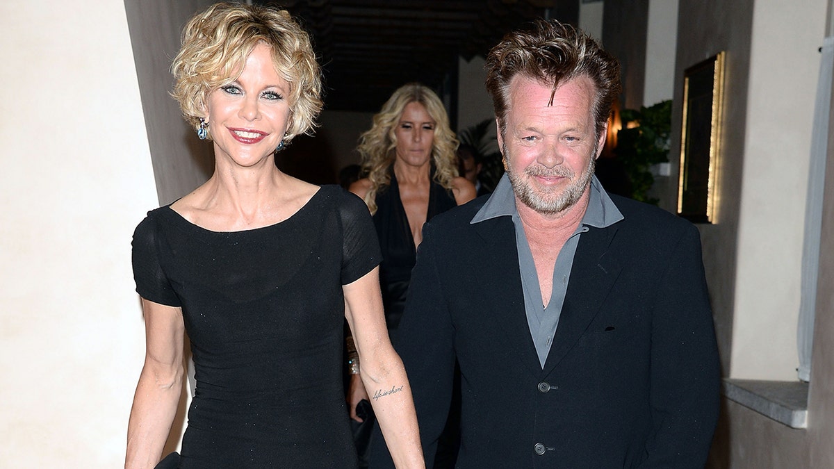 TAORMINA, ITALY - JUNE 20:  Meg Ryan and John Mellencamp attend Taormina Filmfest 2013 2013 at Teatro Antico on June 20, 2013 in Taormina, Italy.  (Photo by Venturelli/Getty Images)