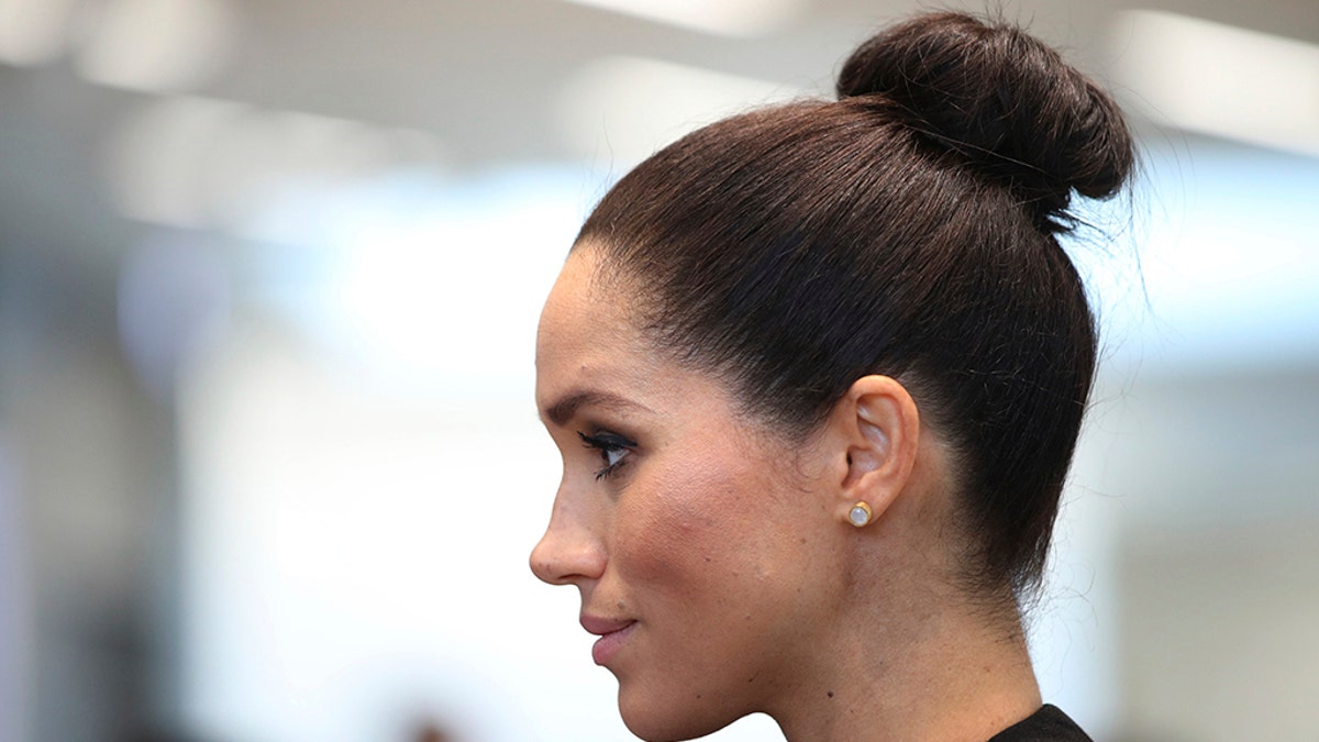 Meghan, the Duchess of Sussex looks on during a visit to the Association of Commonwealth Universities, at the University of London, Thursday, Jan. 31, 2019, her first official visit with the ACU in her new role as Patron of the international organisation which is dedicated to building a better world through higher education. 