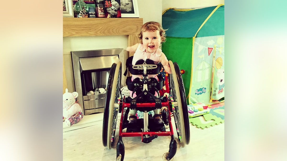 Harmonie-Rose will mostly be pushed around the course in her wheelchair, but her family hope she will be able to run the last few meters on her prosthetic legs.