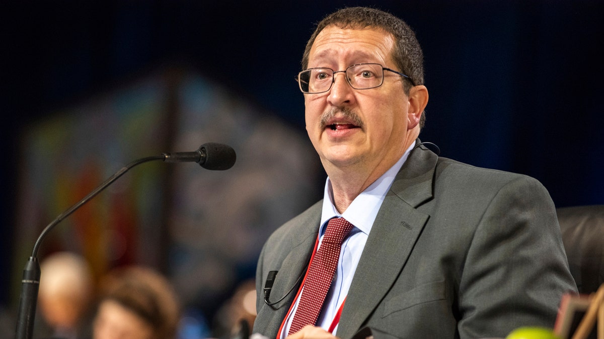 The Rev. Gary Graves, secretary of the General Conference, moderates a discussion during the 2019 Special Session of the General Conference of The United Methodist Church in St. Louis, Mo., Tuesday, Feb. 26, 2019.