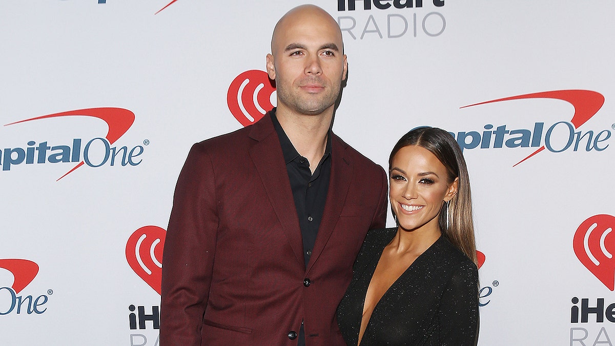 BURBANK, CALIFORNIA - JANUARY 18: Mike Caussin and Jana Kramer attend the iHeartRadio Podcast Awards held at iHeartRadio Theater on January 18, 2019 in Burbank, California. (Photo by Michael Tran/FilmMagic)