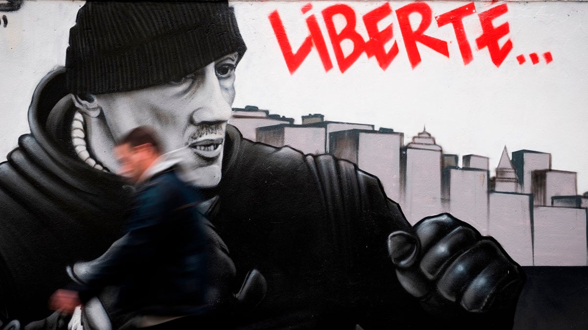 A mural of Christophe Dettinger, the former professional boxer turned "yellow vest" protester. He was given a one-year prison sentence on Wednesday night.