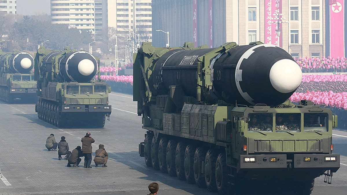 Intercontinental ballistic missiles are seen at a grand military parade in Pyongyang, North Korea.