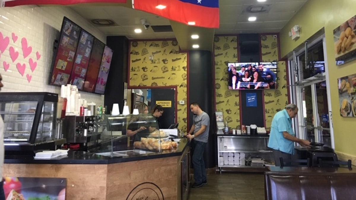Molero owns the Super Arepa Doral in Doral, Florida. Venezuelan expats are now asking why demonstrators would protest Trump's speech Monday when the situation back home is in such disarray
