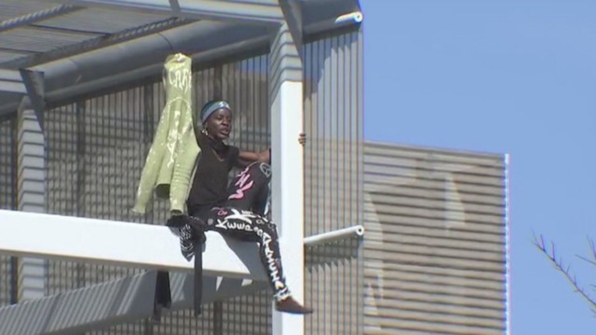 Therese Patricia Okoumou spent nearly 8 hours on the Southwest Key building in East Austin.