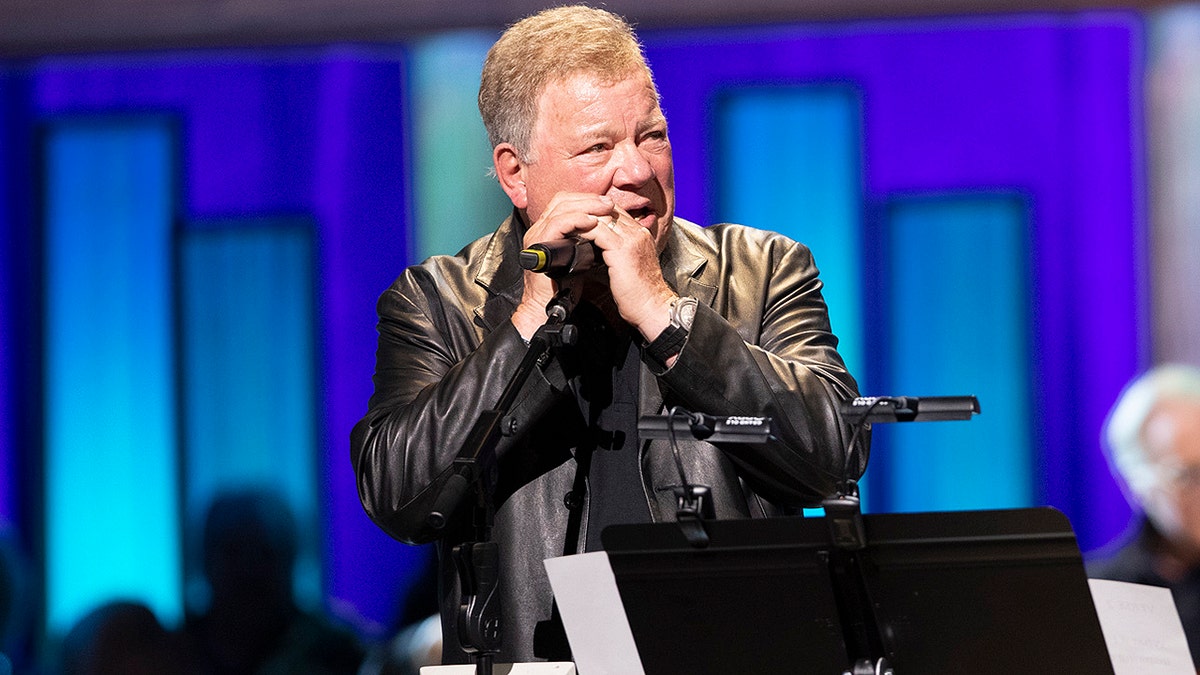 Actor William Shatner, left, and Jeff Cook, of the band Alabama perform the title track from their country album 