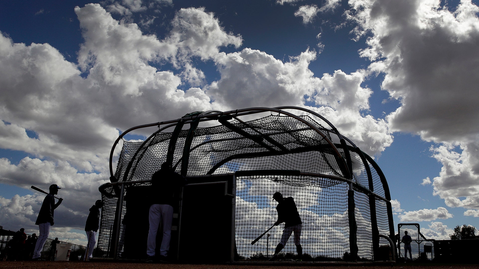 Seattle Mariners' Ichiro Suzuki bats during baseball spring training in Peoria, Ariz., Feb. 16, 2019. 