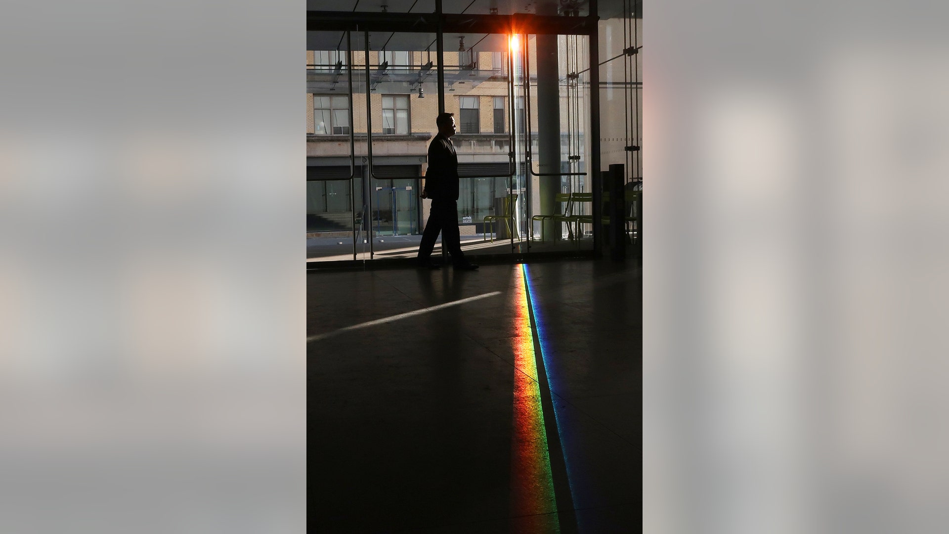 Sunlight passes through the front windows of the Whitney Museum of American Art causing a rainbow effect on the lobby floor, January 31, 2019.
