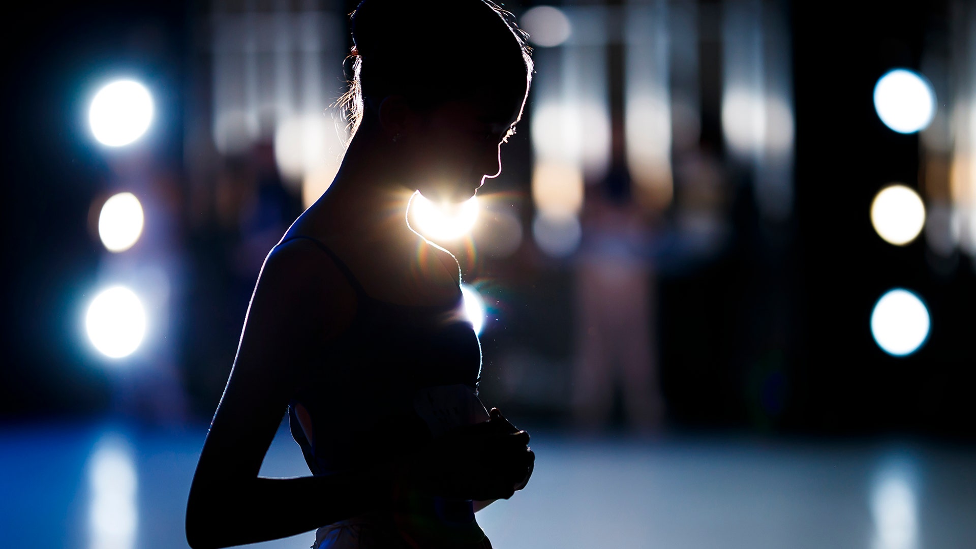 A dancer waits to step on stage during the first day of the 47th Prix de Lausanne in Lausanne, Switzerland, Feb. 4, 2019. 