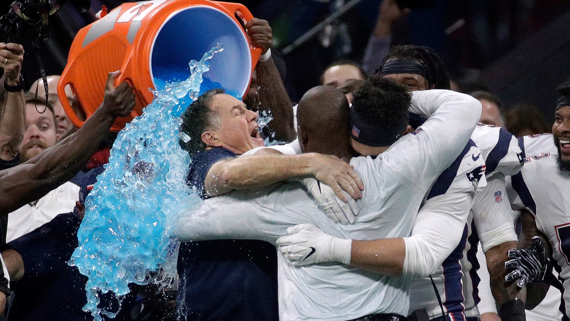 New England Patriots head coach Bill Belichick gets doused after winning Super LIII  against the Los Angeles Rams in Atlanta, Feb. 3, 2019. 