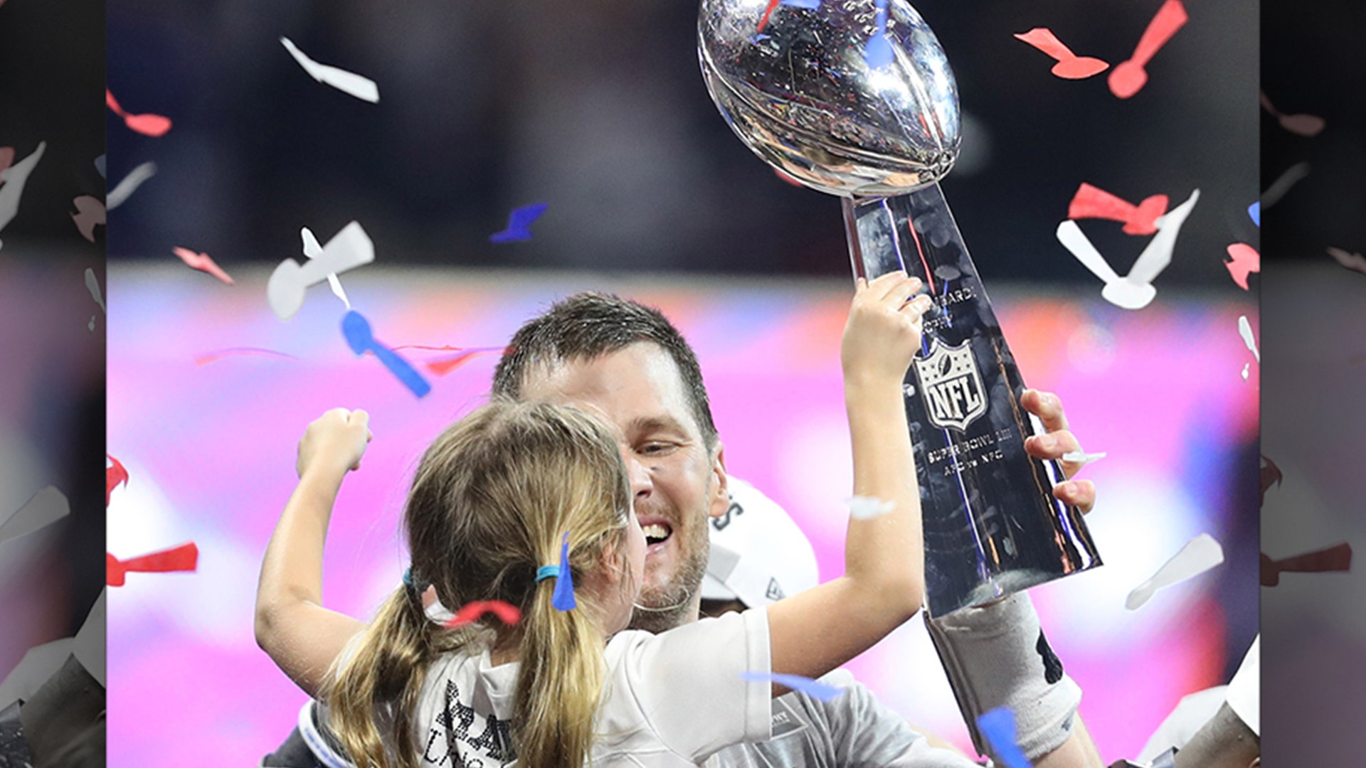 New England Patriots quarterback Tom Brady celebrates with his daughter Vivian after winning the Super Bowl against the Los Angeles Rams in Atlanta, February 3. 2019.