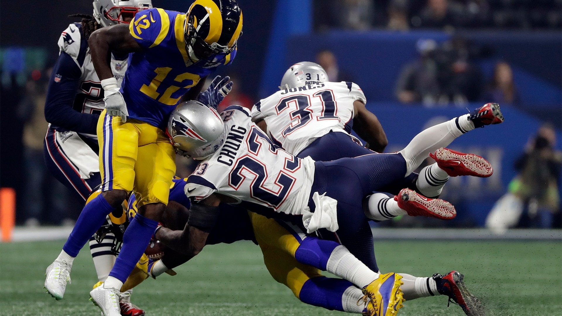 New England Patriots Patrick Chung is injured as he hits Los Angeles Rams Brandin Cooks during the second half of the Super Bowl in Atlanta, February 3. 2019.