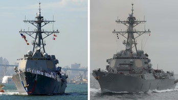 US Navy warships sail in South China Sea near contested manmade island