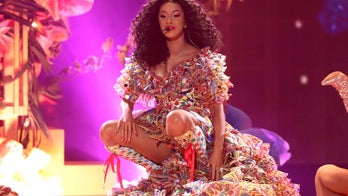 Cardi B opens up about suffering from postpartum depression: 'The world was heavy on my shoulders'