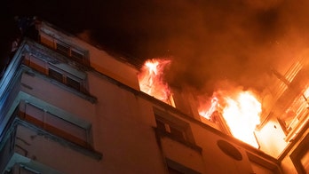 Paris building fire death toll rises to 10, arson eyed