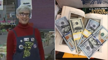 Arizona volunteer finds $4G in hollowed-out book, then tracks down owner, returns cash
