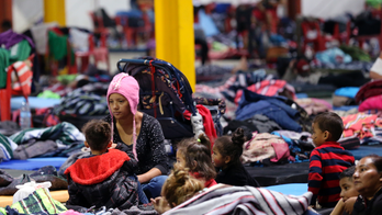 Frustration grows as migrant caravan stuck in Mexico shelter