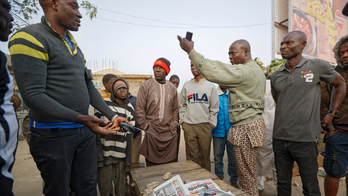 The Latest: Nigerian president 'disappointed' by poll delay