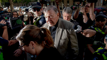 The Latest: Pell's bail revoked, sentencing set for March 13