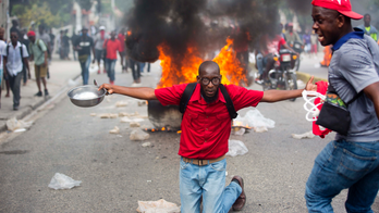 Thousands protest to demand Haitian president's ouster