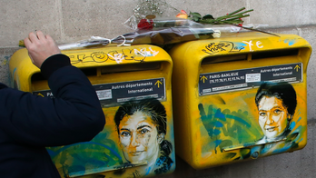 Artist restores vandalized portraits of Holocaust survivor
