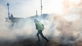 France's yellow vests mark 3 months amid racist tensions