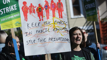 The Latest: Striking teachers rally at Oakland City Hall