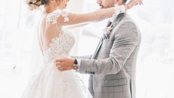 Wheelchair-bound groom stands for first dance with bride in 'beautiful,' heartwarming video