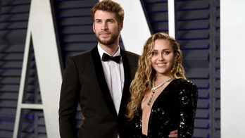 Miley Cyrus stuns at Vanity Fair Oscars party in low-cut gown, avoids run-in with ex Stella Maxwell