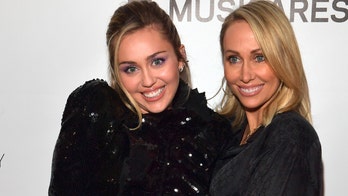Miley Cyrus' mom sparks white privilege debate after posing with a very large amount of marijuana