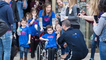 Texas community celebrates boy's 'miraculous recovery' with superhero sendoff